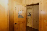 Unique Alaskan log home in trees & wild flowers on 14-acre private homestead.