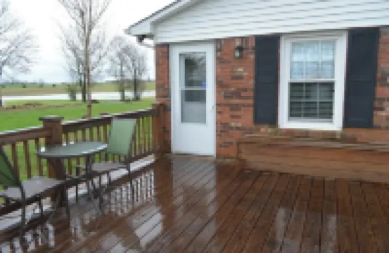 Country Setting with Mature Trees, Large Deck. Game/Rec Room, Fire Pit and Grill