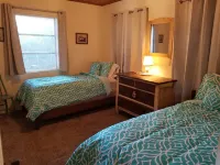 Lakefront getaway with white sand, clear water, gorgeous sunsets