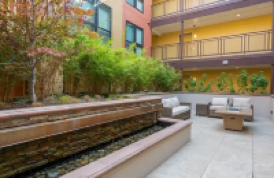 Work Here • Secure • Elevator • Luxe Kitchen & Bath • King Bed • W/D • Gig WiFi