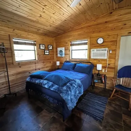 Buckeye cabin is nestled in the woods with access to the Little Missouri River.