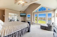 Lake Front Home w/ Hot Tub, Fire pit, yard, walk to Wisp Resort,Tubing Hill View