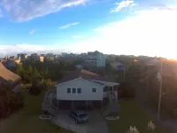 “Wait-n-Sea” this adorable beach box, located oceanside Hotels near Outer Banks