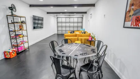 River Home with Huge Arcade, Hot Tub, Kayaks, Mini Golf Course, 80in TV