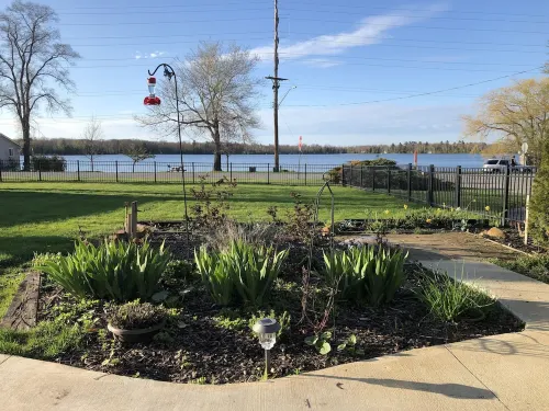 Bass Lake Views & Access. Walk Downtown Elk Rapids.