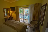 Le Cozmo Guesthouse