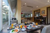 斯拉查經典卡美奧飯店及服務式公寓