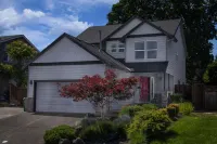 Spacious Backyard and Gourmet Kitchen Amenities - Charming Retreat