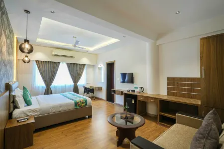 Treebo Pappilon Palace - Pvs Circle Отели рядом с достопримечательностью «Sultan Bathery»