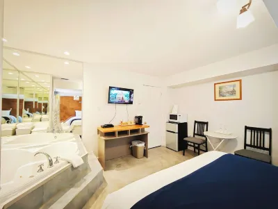 Motel des Pentes et Suites Hotels near Le Jardins de Francois