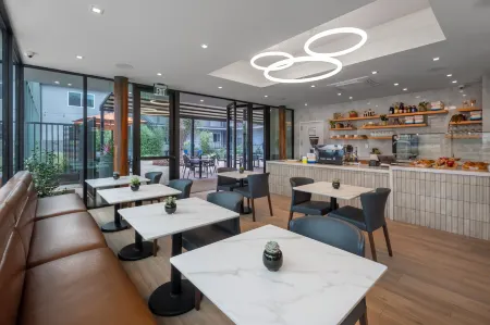 The Olivia Hotel Отели рядом с достопримечательностью «Парк Холмби»