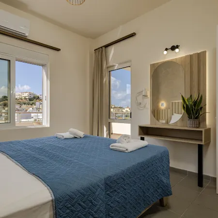 Theos Village Apartments