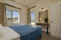 Theos Village Apartments