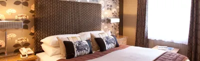 Burt's Hotel Hotel di 