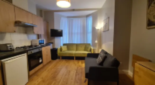 Waterworks En Suite Rooms with Private Living Room