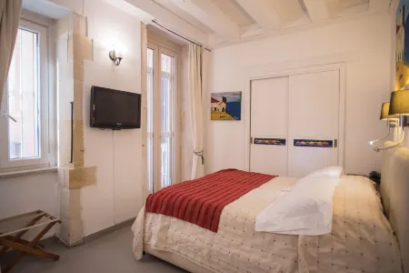 Aretusa Vacanze B&B Отели рядом с достопримечательностью «Piccolo Teatro dei Pupi»