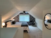 Charming 3-bedroom house with fenced yard in a quiet  neighborhood  Dog Friendly Hotels near American Freight - Appliance, Furniture, Mattress