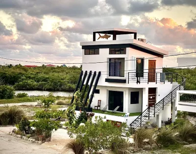 Charming Modern Beach Villa with 360 Island views & easy resort access Hôtels à : 