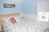 Sandy Gem- Waterfront Cottage w/ Sunset Views & Private Dock