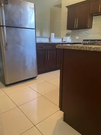 A Cozy Apartment Sitting on a Hill.