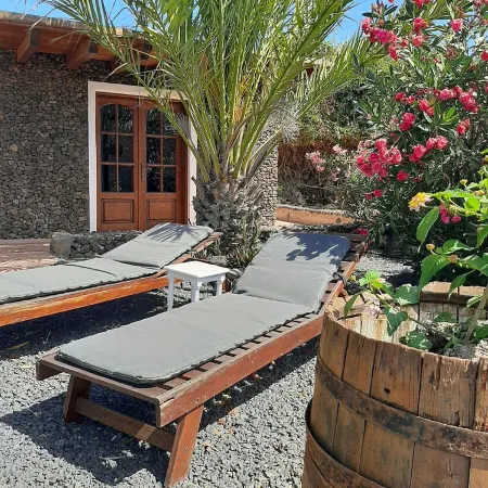 Volcanic lava stone house short walk to the beach, sea and mountain views