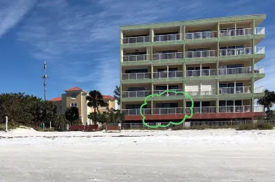 Enjoy beautiful sunsets from the balcony or wade into the waves just steps away! Hotels near Tiki Gardens - Indian Shores Beach Access