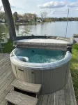 Beautiful 4-bedroom  Lake Front Cottage with HOT TUB & rentable BOAT