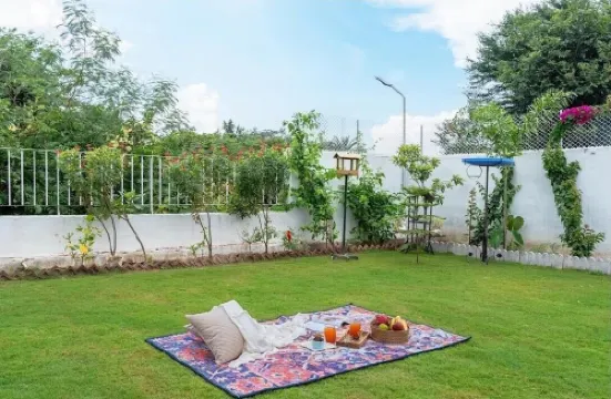 Two-bedroom boutique homestay with a serene view of Lake Lakhawali and Aravalis.