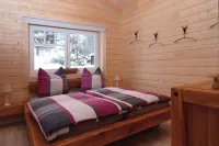 Log cabin by the lake with sauna and fireplace in the middle of the Harz mountains and forests