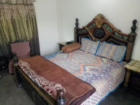 Furnished Room/Budget Friendly near Lahore Airport Отели рядом с достопримечательностью «Парк Аль Амед Гарден»