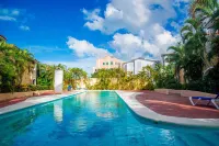 Cozy apartment at Cocotal Golf Suites - Kolam Renang Peribadi