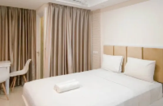 Basic Studio Apartment at Tamansari Skylounge Makassar By Travelio