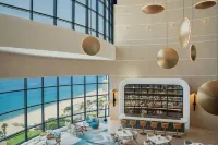 Le Méridien Al Aqah Beach Resort - bar