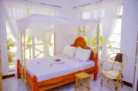 Room L: Room: s Beach Front Sea View 3Rdlat 2 Guests