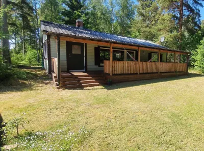 Well-Equipped Beachside Cottage Hotels near Lillöbadet, familjebadet Oknö