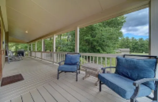 Creekfront Hayesville retreat w/ wrap-around porch and views!