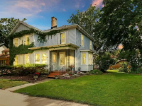 Historic house on tree lined red brick street of historic homes. Hotels in Racine