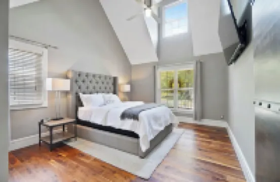 High-end home w/ fireplace, gourmet kitchen, sauna, game rm/ large yard/fire pit