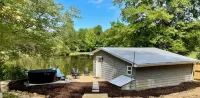 Cozy Lakefront Cottage with Hot Tub on 25-Acre Private Retreat