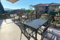 Brand new apartment Arancia with swimming pool and huge balcony 250 meters from the lake