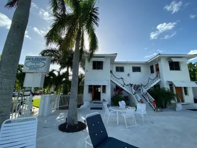 Upstairs unit w Pool view, enclosed porch & workspace