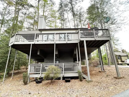 Big Canoe cottage on Lake Sconti with water and golf course views