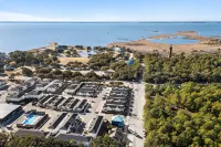 Lighthouse Views, Beach Parking Pass, & Furry Family Members Welcomed Hotels in Corolla