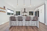 * Ocean view rooftop* Peloton* Modern & New