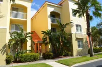 Resort Style Condo Hotels near Champs Sports