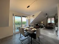 BlackNCozy - Design apartment with box-spring bed and balcony Hotels in Lorrach