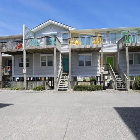 Not quite ocean front, but almost! Just a few steps to the sand! Pet friendly.