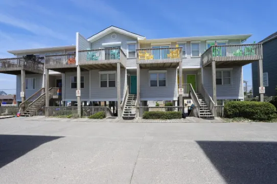 Not quite ocean front, but almost! Just a few steps to the sand! Pet friendly.