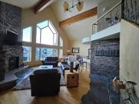 Charming Big Sky meadows house. Trails and Town Center a short walk away.