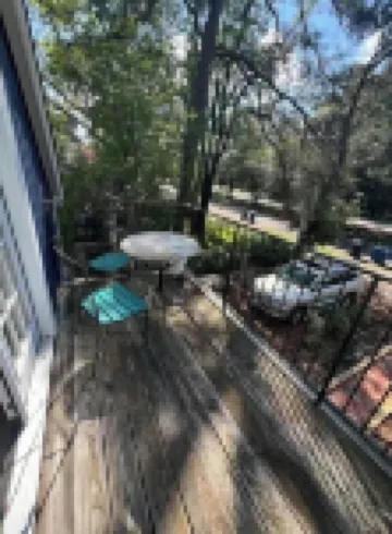 Heart of Old beach, outdoor porch overlooking the garden,